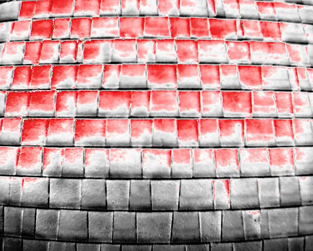 Thermal drone scan of residential shingle roof showing heat zones indicating hail damage