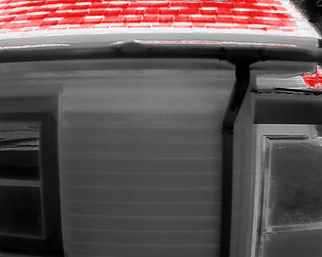Thermal scan of roof edge showing strong red heat signature indicating heat loss at roofline
